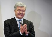 Ukrainian former President Poroshenko gives a news conference in Warsaw