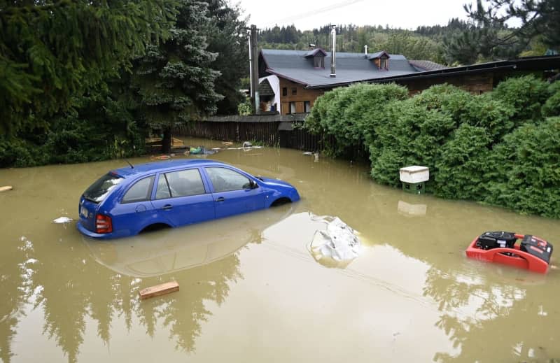 The Upper Betschwa River flooded after heavy rainfall. Glück Dalibor/CTK/dpa