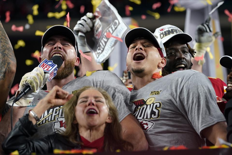 Kansas City Chiefs' Travis Kelce, left, and Patrick Mahomes celebrate after defeating the San Francisco 49ers in the NFL Super Bowl 54 football game Sunday, Feb. 2, 2020, in Miami Gardens, Fla. (AP Photo/David J. Phillip)