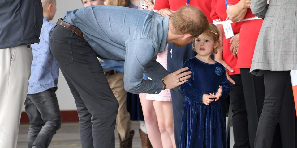 <p>Harry meets a young fan.</p>