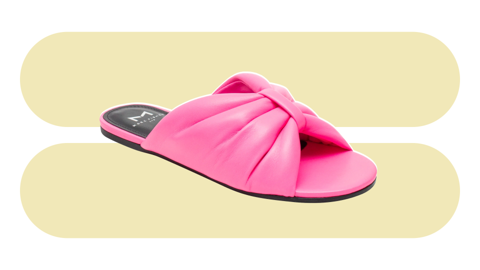 The Olita Flat Slide Sandal from Marc Fisher is an update to a perennial classic.