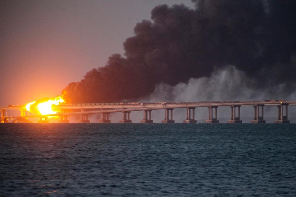 Flames on the Crimean Bridge after an attack in October (AP)