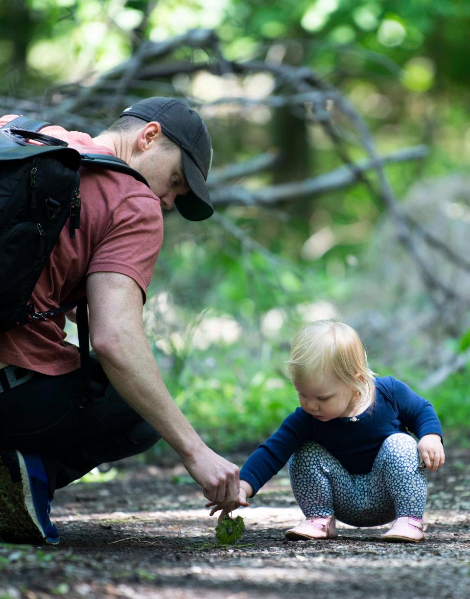 Bobby Watson takes his daughter to Olivia, 18 months, to Radnor Lake State Park in Oak Hill, Tenn., Tuesday, May 11, 2021.