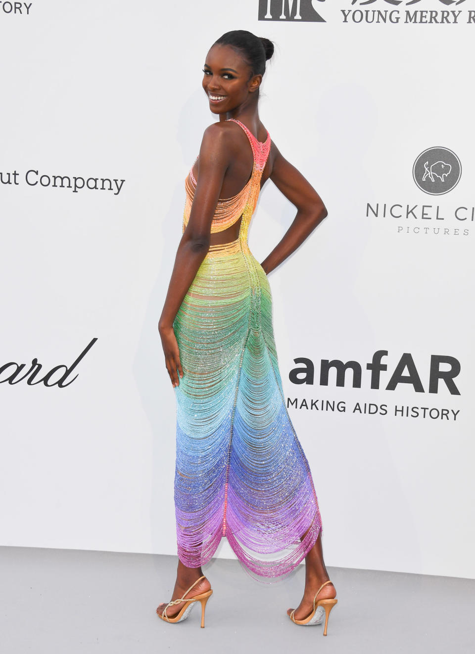 Supermodel Leomie Anderon cheered up the red carpet in a gloriously bright rainbow ensemble by Rami Kadi. <em>[Photo: Getty]</em>