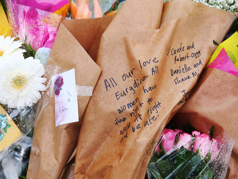 Tributes to Eurydice Dixon are placed at a Princes Park memorial. Source: Getty