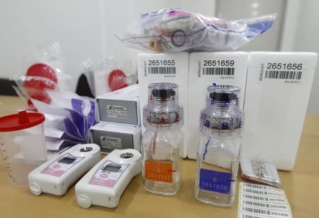 Anti-doping control kits are pictured at an anti-doping control centre at the stadium in Daegu, southeast of Seoul, South Korea, in this August 24, 2011 file photo. REUTERS/Lee Jae-Won/Files