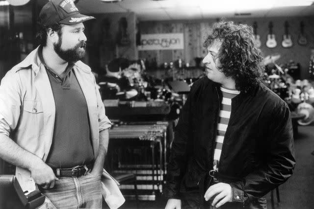 <p>Authorized Spinal Tap LLC/Shutterstock</p> Rob Reiner and David Kaff on the set of 'This Is Spinal Tap'