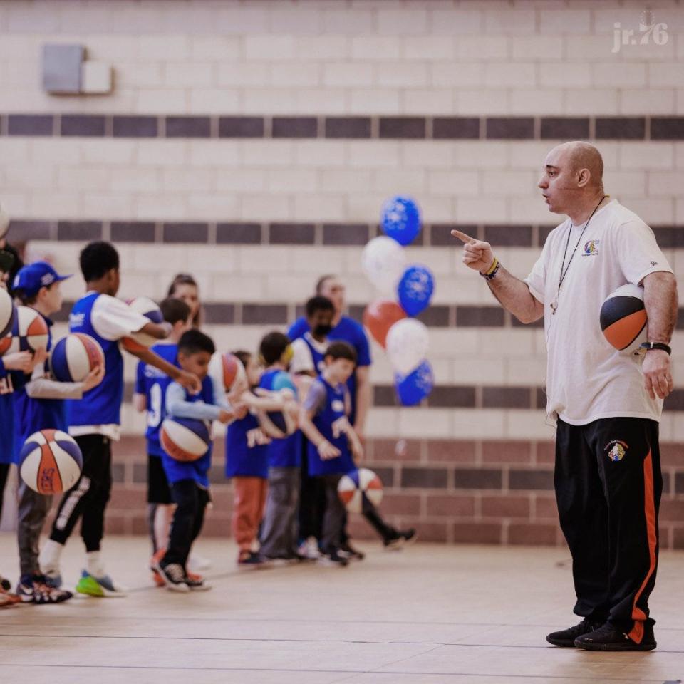 Founder Mike Simmel leading instruction at one of his Bounce Out the Stigma basketball camps for special needs kids.