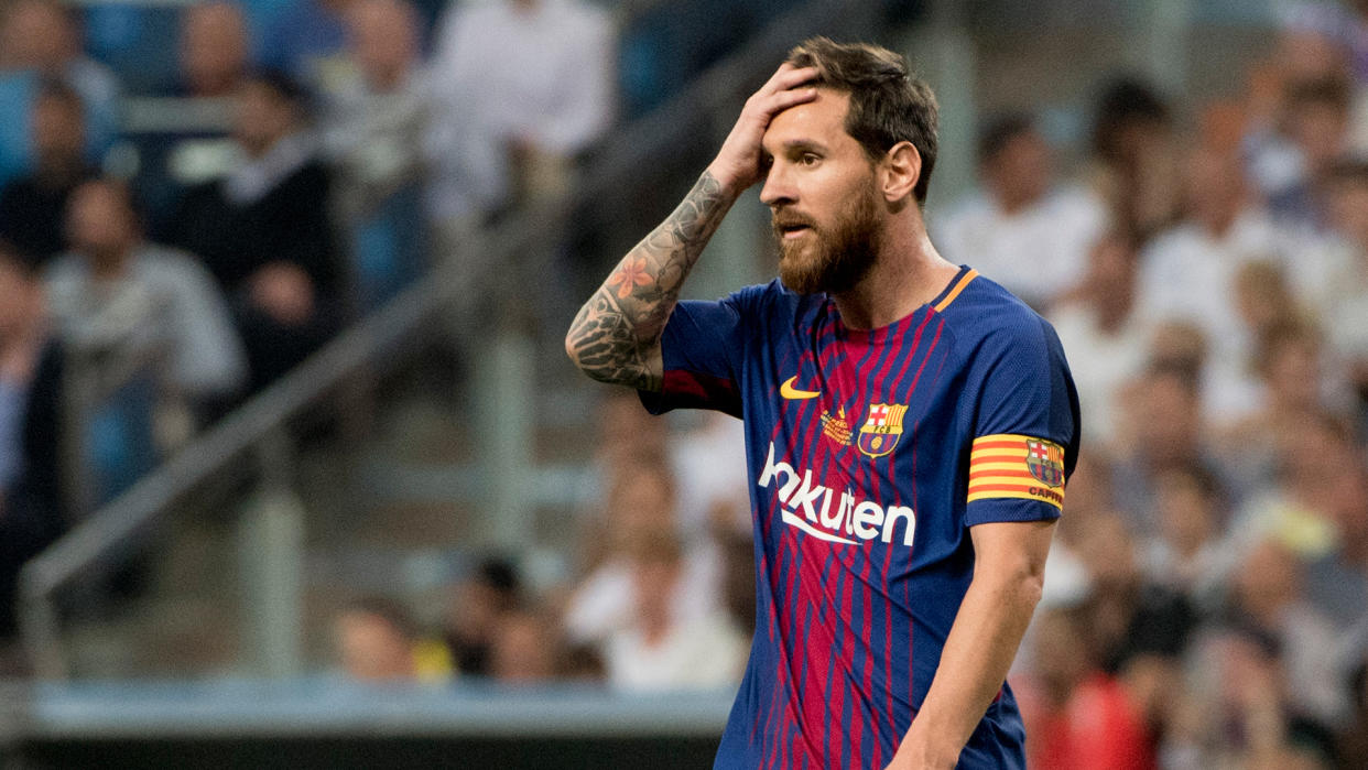 Lionel Messi and Barcelona suddenly find themselves well behind Real Madrid. (Goal.com)