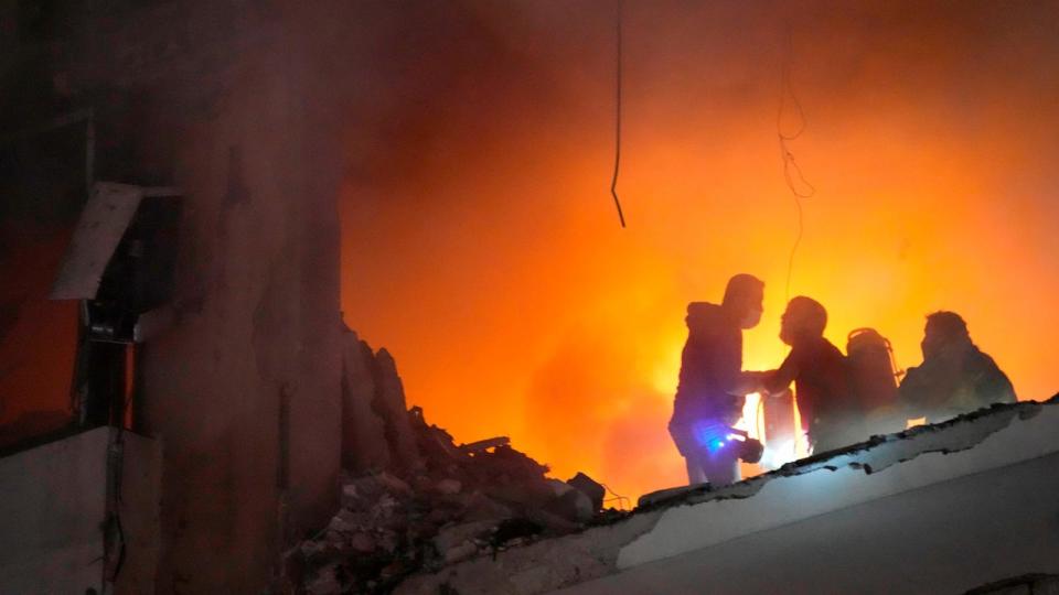 PHOTO: Firefighters try to extinguish the fire inside an apartment following an explosion in the southern suburb of Beirut, Lebanon, Jan. 2, 2024. The TV station of Lebanon's Hezbollah group says top Hamas official Saleh Arouri was killed Tuesday. (Hussein Malla/AP)