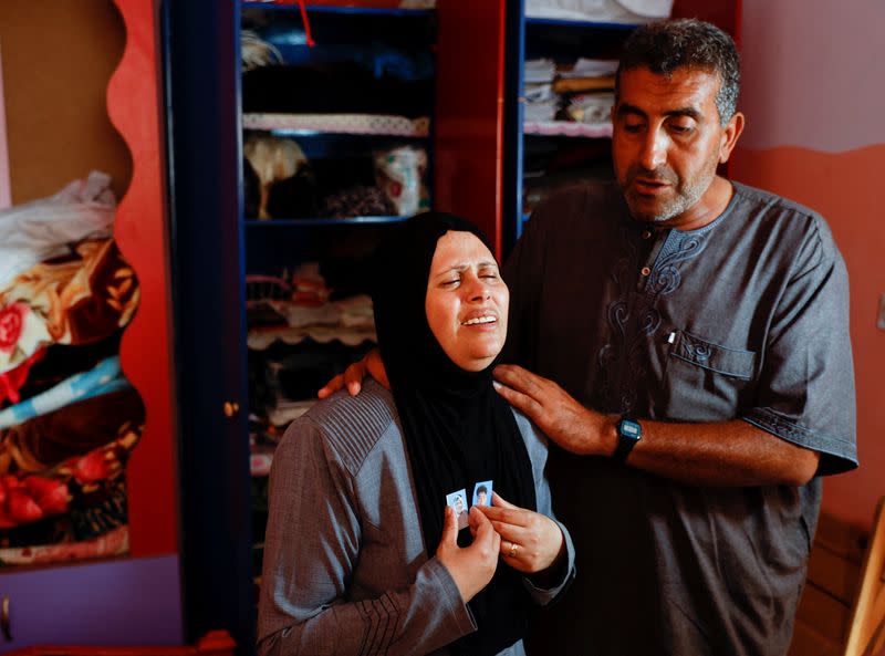 Palestinian mother mourns son killed in a missile strike, in Gaza