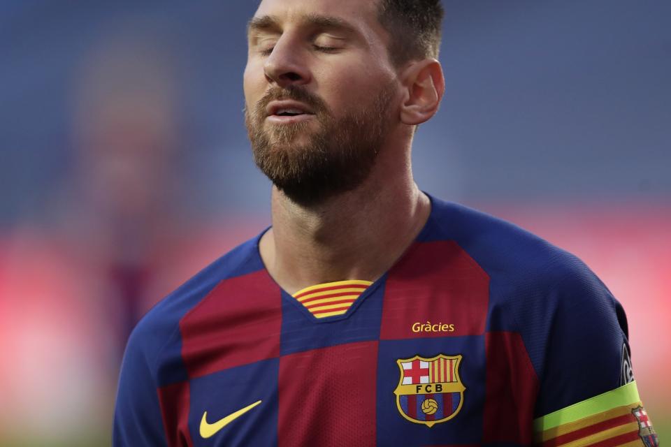 Barcelona's Lionel Messi reacts during the Champions League quarterfinal match between FC Barcelona and Bayern Munich at the Luz stadium in Lisbon, Portugal, Friday, Aug. 14, 2020. Gerard Piqué says Barcelona "hit rock bottom" in an 8-2 humiliation from Bayern Munich in the Champions League quarterfinals. It's 74 years since Barcelona conceded eight goals in a game. (AP Photo/Manu Fernandez/Pool)