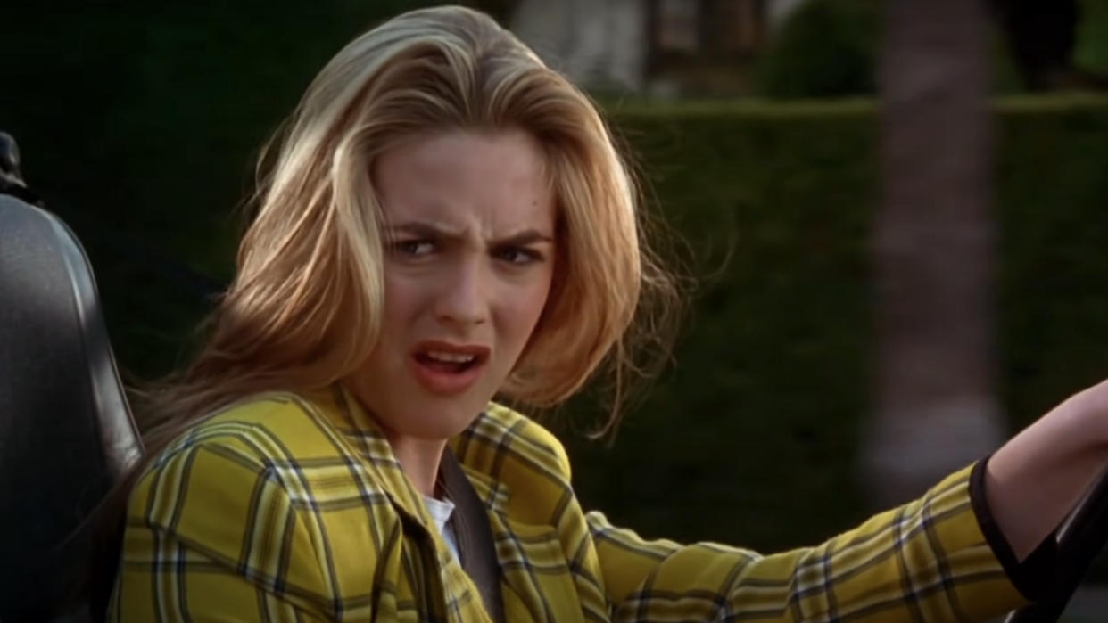  Alicia Silverstone looks disgusted behind the wheel in Clueless. 