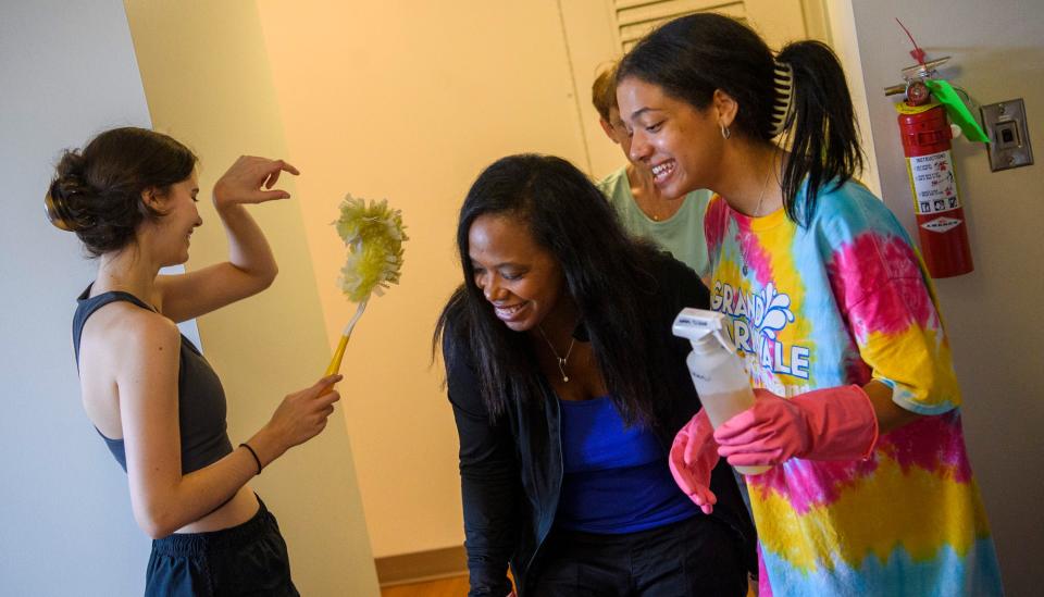 Incoming freshman Samara Black, right, Erin Townsend Black, her mom, middle and fellow freshman Adriana Martin, left, share a laugh as they clean their new room at Union Street Center during the first day of Welcome Week at Indiana University Sunday, Aug. 14, 2022.