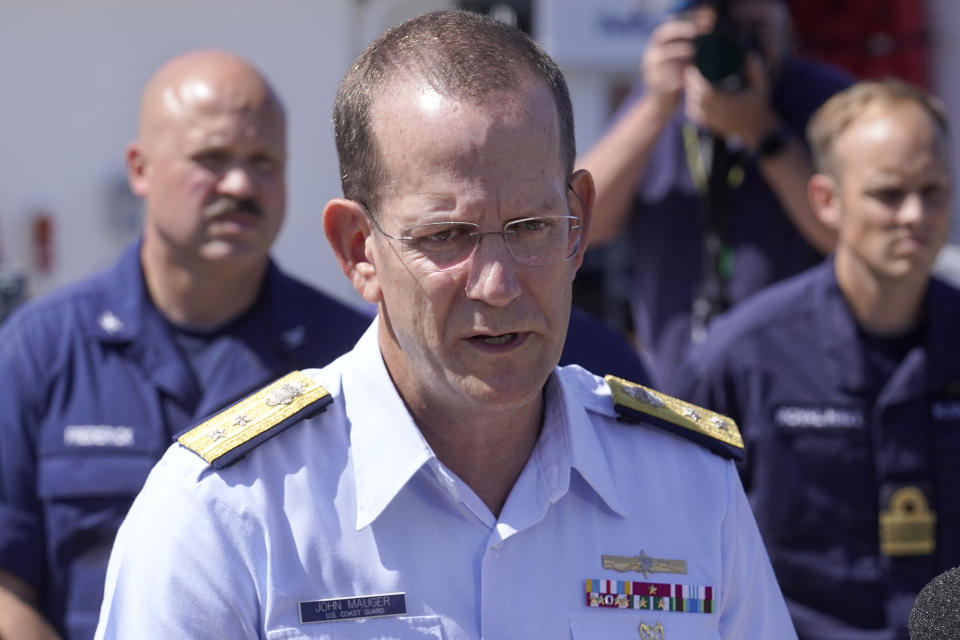 U.S. Coast Guard Rear Adm. John Mauger, commander of the First Coast Guard District, talks to the media, Thursday, June 22, 2023, at Coast Guard Base Boston, in Boston. The missing submersible Titan imploded near the wreckage of the Titanic, killing all five people on board, according to the U.S. Coast Guard. (AP Photo/Steven Senne)