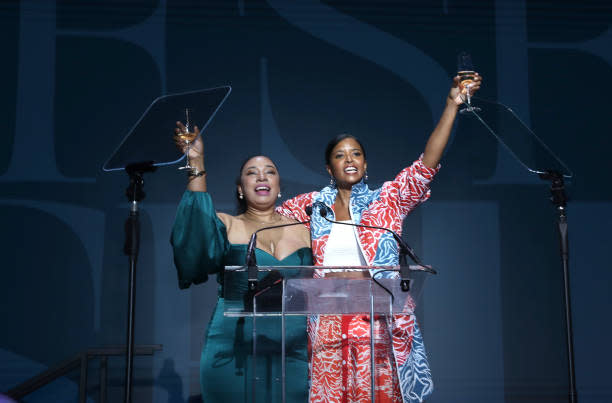 FSG’s Chairman’s Award Winner Naecia Dixon (L) and actress/singer Renée Goldsberry, who hosted the event. (Photo by Bennett Raglin/Getty Images.) - Credit: Getty Images for Fashion Scholar