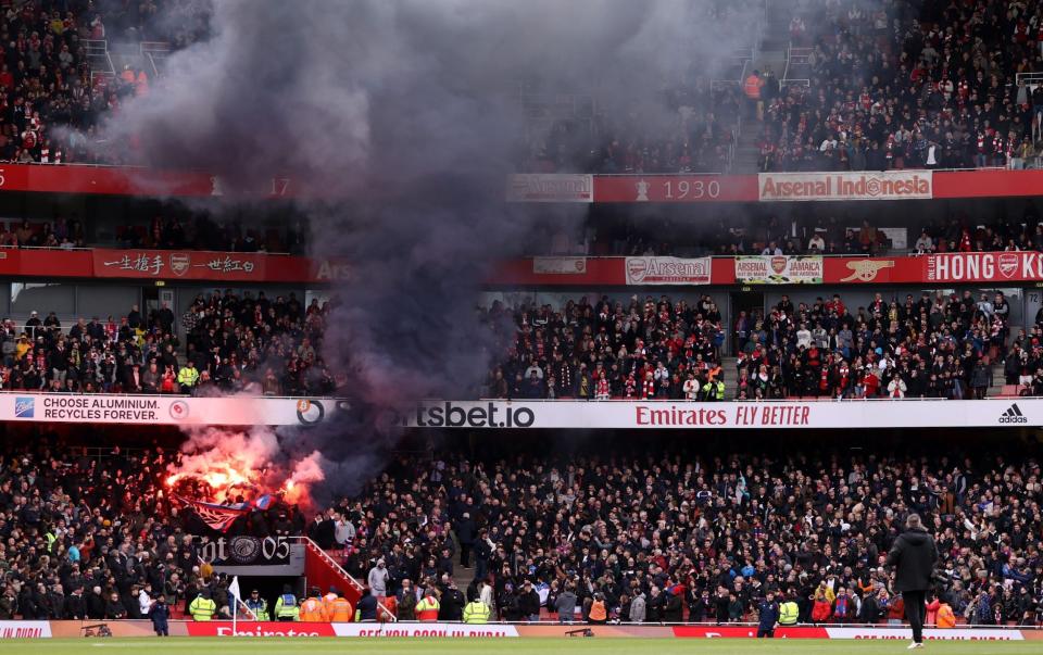 fans of Crystal Palace use Smoke Flares prior to the Premier League match between Arsenal FC and Crystal Palace - Getty Images Europe