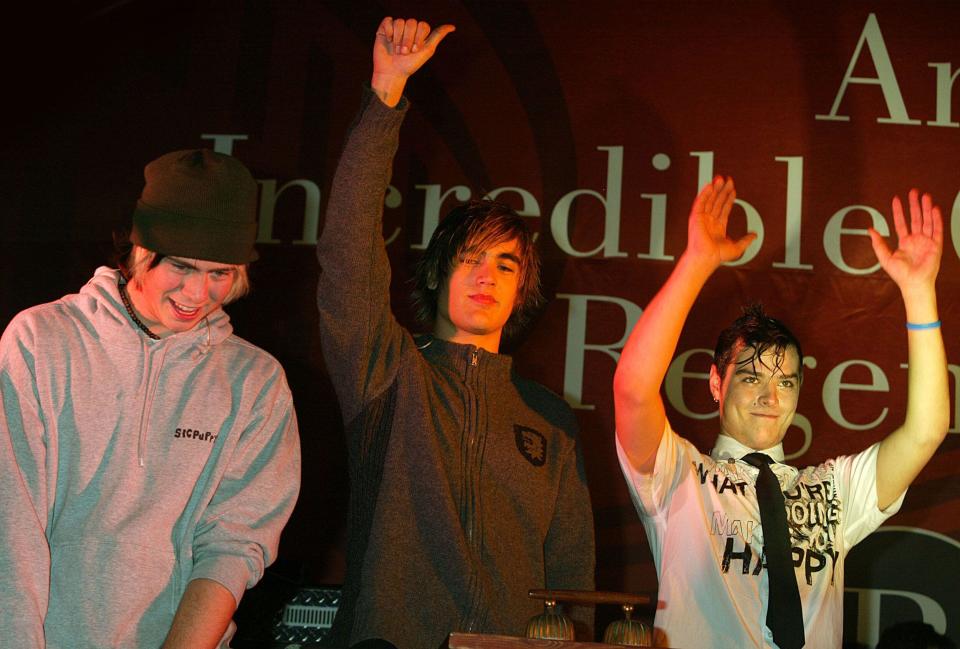 Busted James Bourne; Charlie Simpson; Matt Willis attend and perform on stage at the annual Regent Street Christmas Lights switching-on ceremony, having performed live, in Regent Street on November 7, 2004 in London.