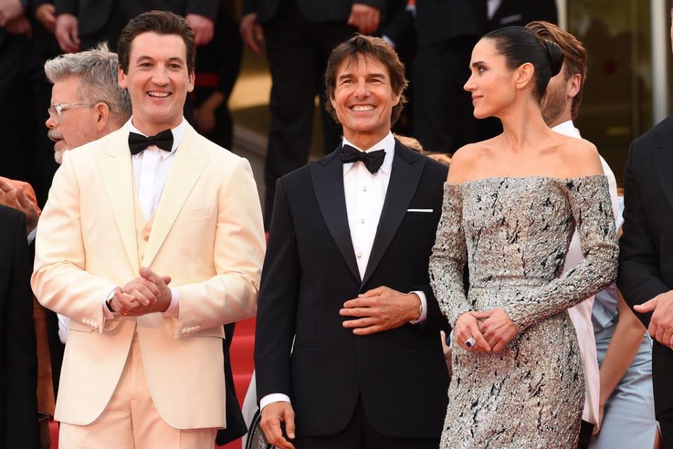 Miles Teller, Tom Cruise and Jennifer Connelly attend the ‘Top Gun: Maverick’ premiere during the 75th Cannes Film Festival (PA Wire)