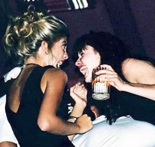 <p>Tori Spelling/Instagram</p> Tori Spelling and Shannen Doherty laugh in cute '90s throwback pic.