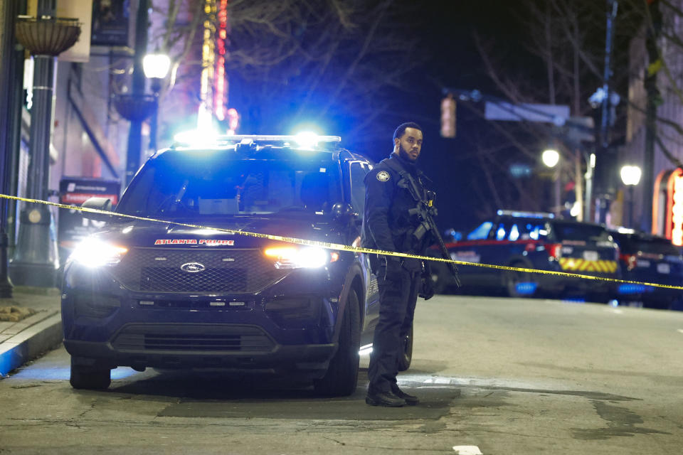 Police block downtown streets following a protest, Saturday, Jan. 21, 2023, in Atlanta, in the wake of the death of an environmental activist killed after authorities said the 26-year-old shot a state trooper. (AP Photo/Alex Slitz)