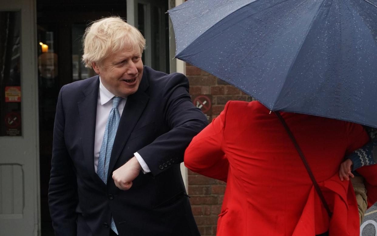 Prime Minister Boris Johnson meets a local after visiting a pub in Harlepool where hen was visiting and newly elected MP Jill Mortimer following Mher victory in the Hartlepool parliamentary by-election. Picture date: Friday May 7, 2021. PA Photo. S - Owen Humphreys/PA Wire