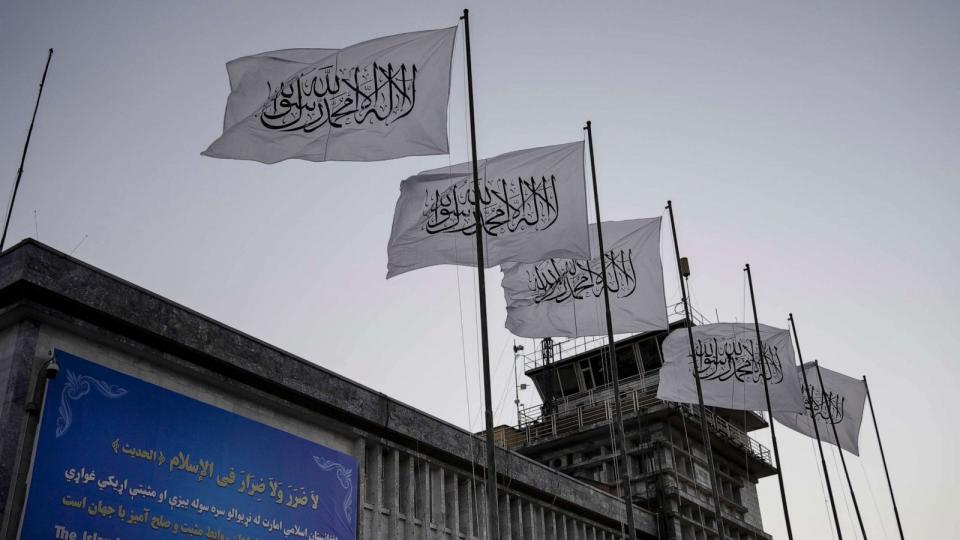 PHOTO: Taliban flags fly at the airport in Kabul, Afghanistan, Sept. 9, 2021 (Bernat Armangue/AP)