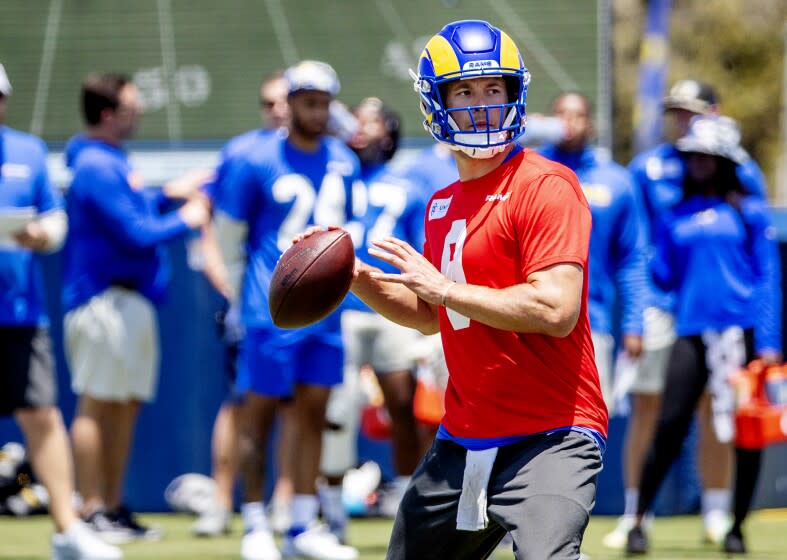 IRVNE, CA - JULY 24, 2022: Rams quarterback Matthew Stafford looks to pass during training camp.