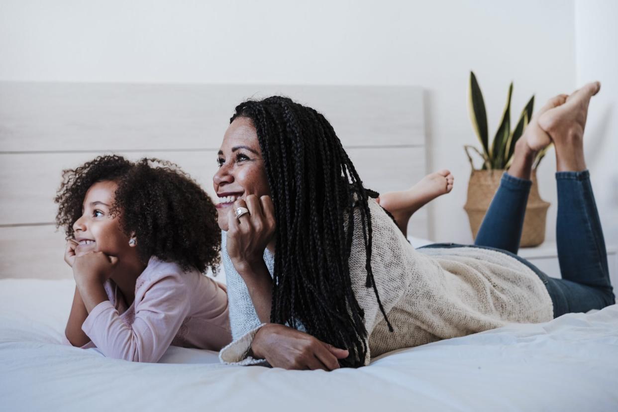 Mother and daughter watch TV