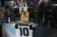 An altar with memorabilia sits in the Church of Maradona in San Andres Cholula, Puebla state, Mexico, Sunday, July 18, 2021. The Church of Maradona in Mexico, dedicated to late soccer great Diego Armando Maradona, was founded a few weeks ago by Argentine expatriate Buchet, who also owns the pizza parlor next door. (AP Photo/Marco Ugarte)