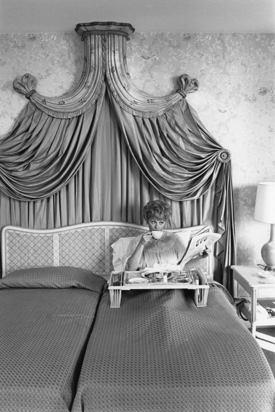 1955: Enjoying breakfast in bed at her New York home in the Hilton Hotel.