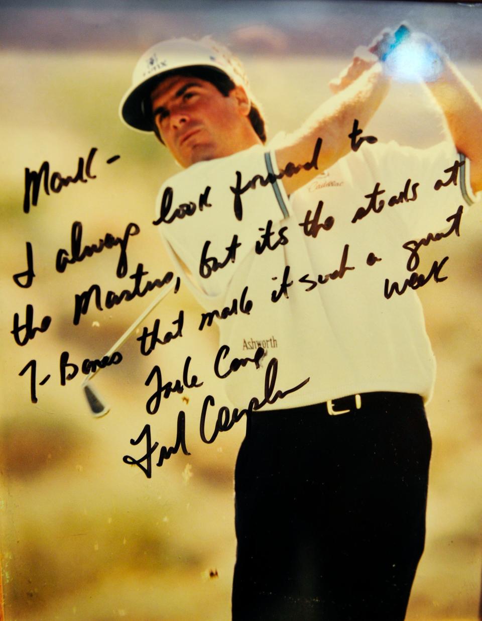 A autographed photo to TBonz Steakhouse owner Mark Cumins from pro golfer Fred Couples hangs inside the restaurant. The walls of TBonz in Augusta include many thank-yous from celebrities who've patronized the restaurant.