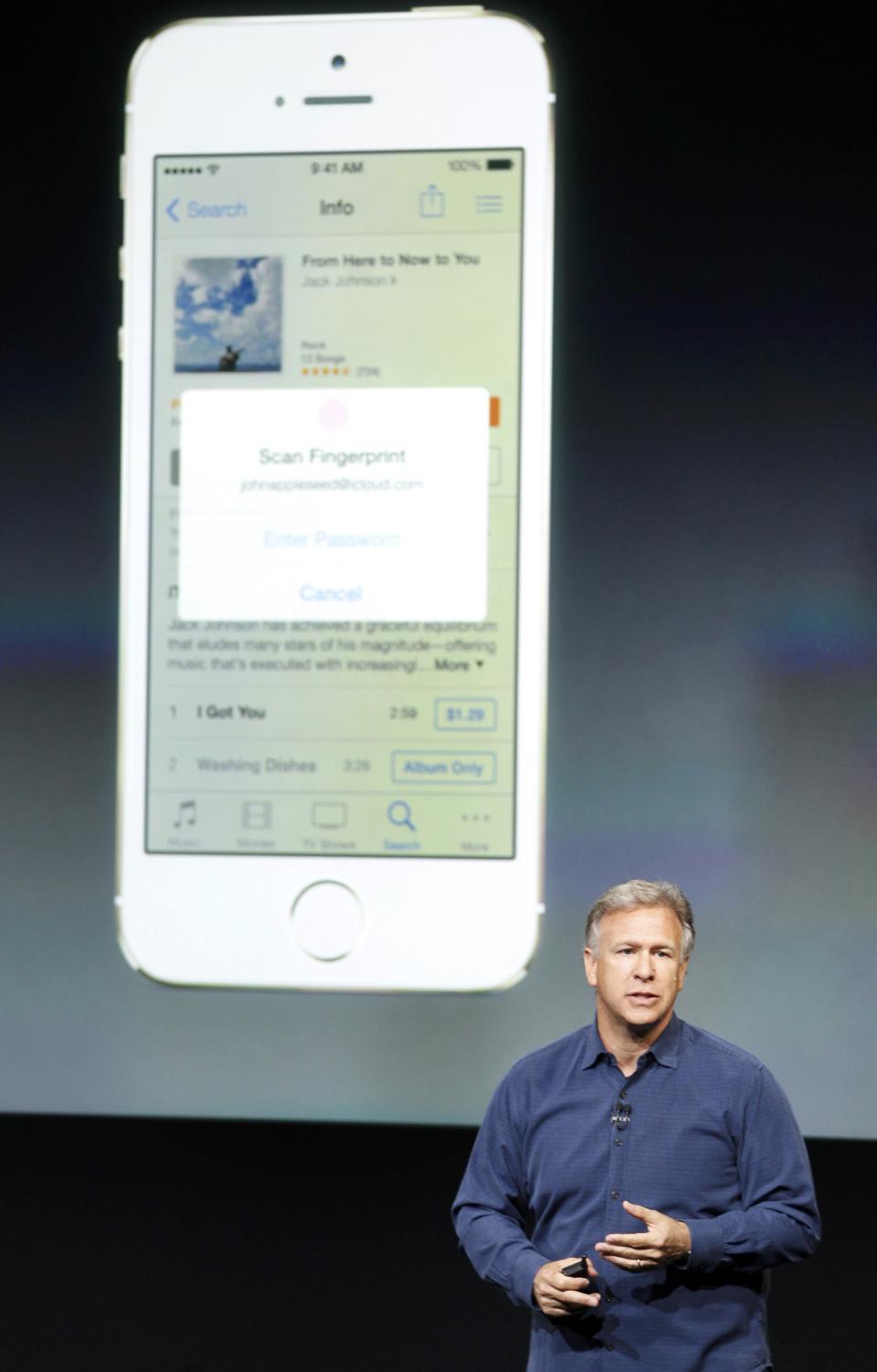 Phil Schiller, senior vice president of worldwide marketing for Apple Inc, talks about the new iPhone 5S Touch ID fingerprint recognition feature at Apple Inc's media event in Cupertino