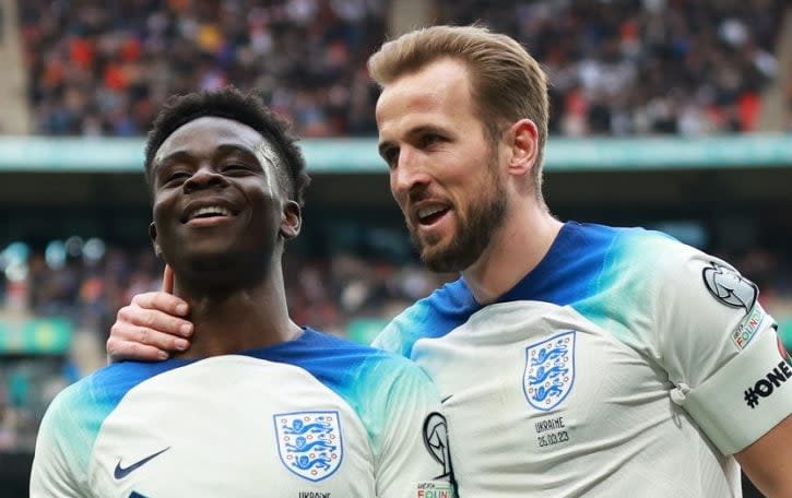 Bukayo Saka of England celebrates with Harry Kane after scoring the team's second goal during the UEFA EURO 2024 qualifying round group C match between England and Ukraine at Wembley Stadium - If Bukayo Saka stays in this kind of form, England can win the Euros - GETTY/Eddie Keogh