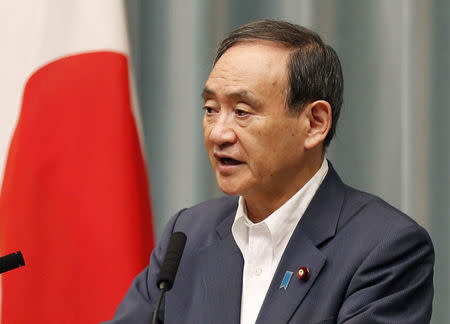 Japanese Chief Cabinet Secretary Yoshihide Suga speaks at a news conference about North Korea's missile launch in Tokyo, Japan in this photo taken by Kyodo on August 29, 2017. Kyodo/via REUTERS