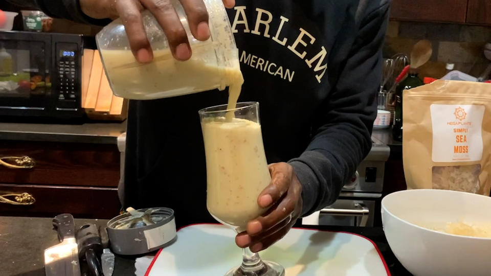 Chef Marcus Samuelsson prepares an Irish sea moss smoothie in his Harlem home. 