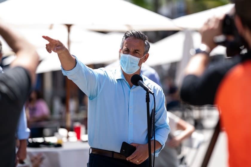 SAN PEDRO, CA - MAY 29: Council member Joe Buscaino of the 15th district, speaks during at an event at a section of Sixth Street is closed down between Mesa and and Centre streets in San Pedro where seating for dining is on Friday, May 29, 2020 in San Pedro, CA. On Friday, Los Angeles County received permission to reopen restaurants for in-person dining and resume services at barbershops and hair salons, marking a new phase in the regions efforts to restart the devastated retail economy. (Kent Nishimura / Los Angeles Times)