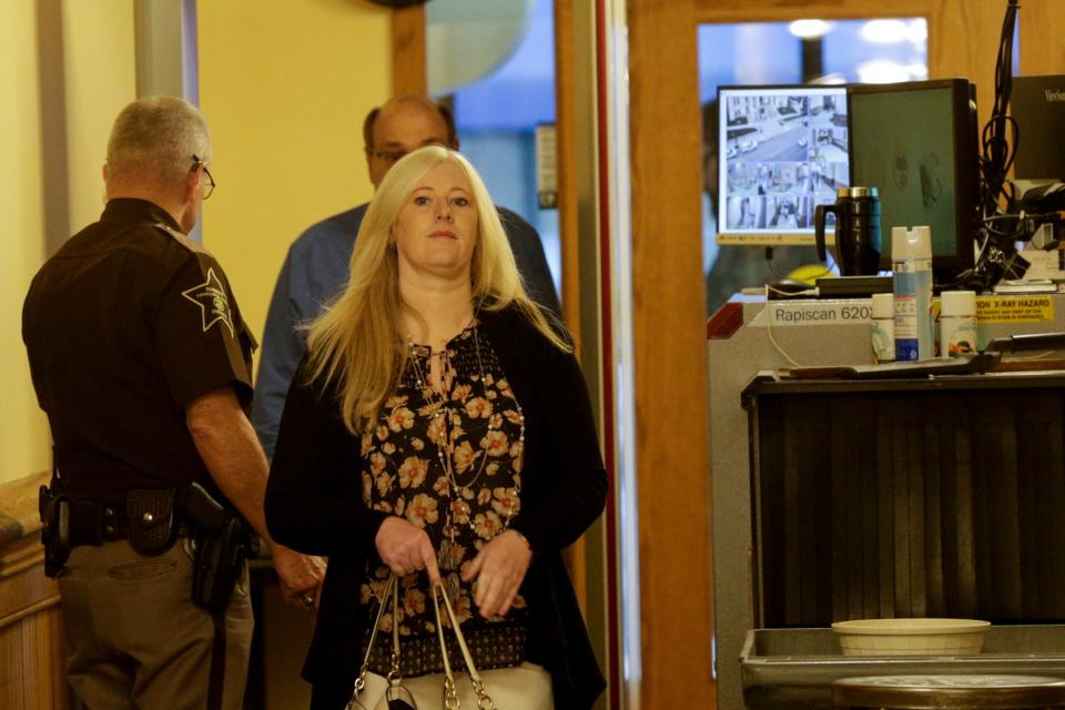 Kristine Barnett walks into the magistrate courtroom for an initial hearing, Friday, Sept. 27, 2019 at the Tippecanoe County Courthouse in Lafayette. Barnett and her ex-husband, Michael Barnett, are accused of abandoning their adoptive daughter in Lafayette in 2013.