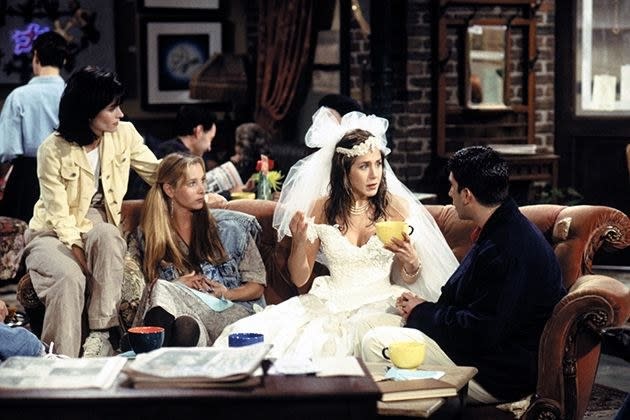 Rachel in her wedding dress at the cafe in Friends