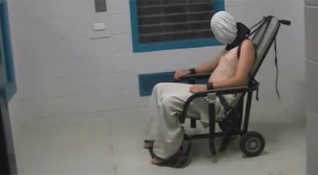 Dylan Voller was strapped to a restraint chair, shackled and hooded. Photo: ABC