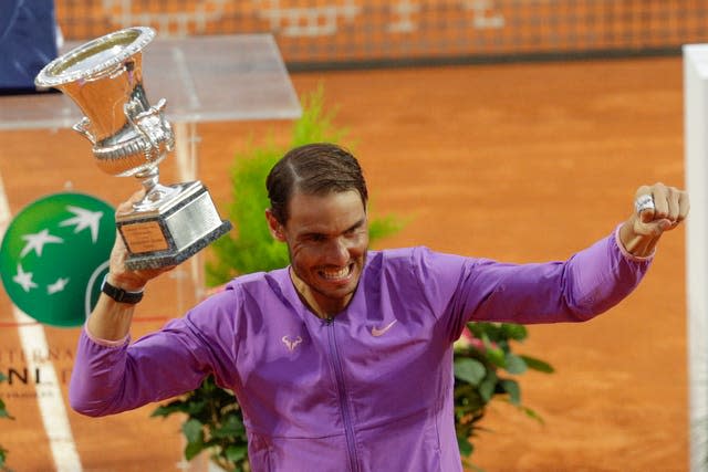 Spain’s Rafael Nadal celebrates with the trophy after winning the Italian Open 