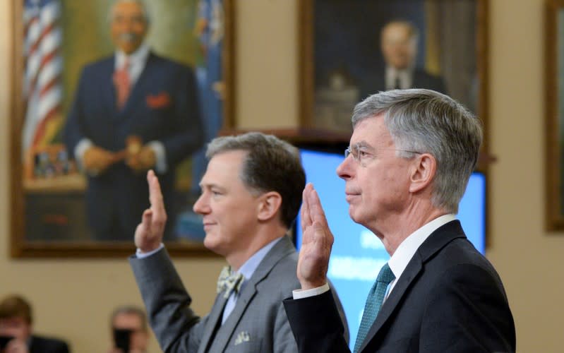 FILE PHOTO: George Kent and William Taylor are sworn in during public hearings in the House impeachment inquiry on Capitol Hill in Washington