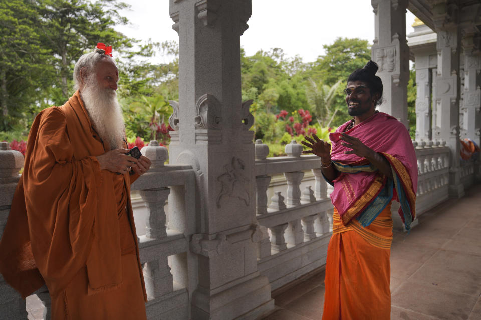 Paramacharya Sadasivanatha Palaniswami and Pravinkumar Vasudeva, right, who serves as priest of Iraivan Temple, at Kauai Hindu Monastery on July 9, 2023, in Kapaa, Hawaii. (AP Photo/Jessie Wardarski)