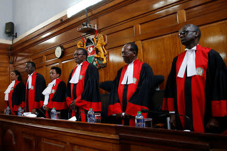 Kenya's Supreme Court judges arrive at the court room before delivering a ruling on cases that seek to nullify the re-election of President Uhuru Kenyatta last month in Kenya's Supreme Court in Nairobi, Kenya November 20, 2017. REUTERS/Baz Ratner