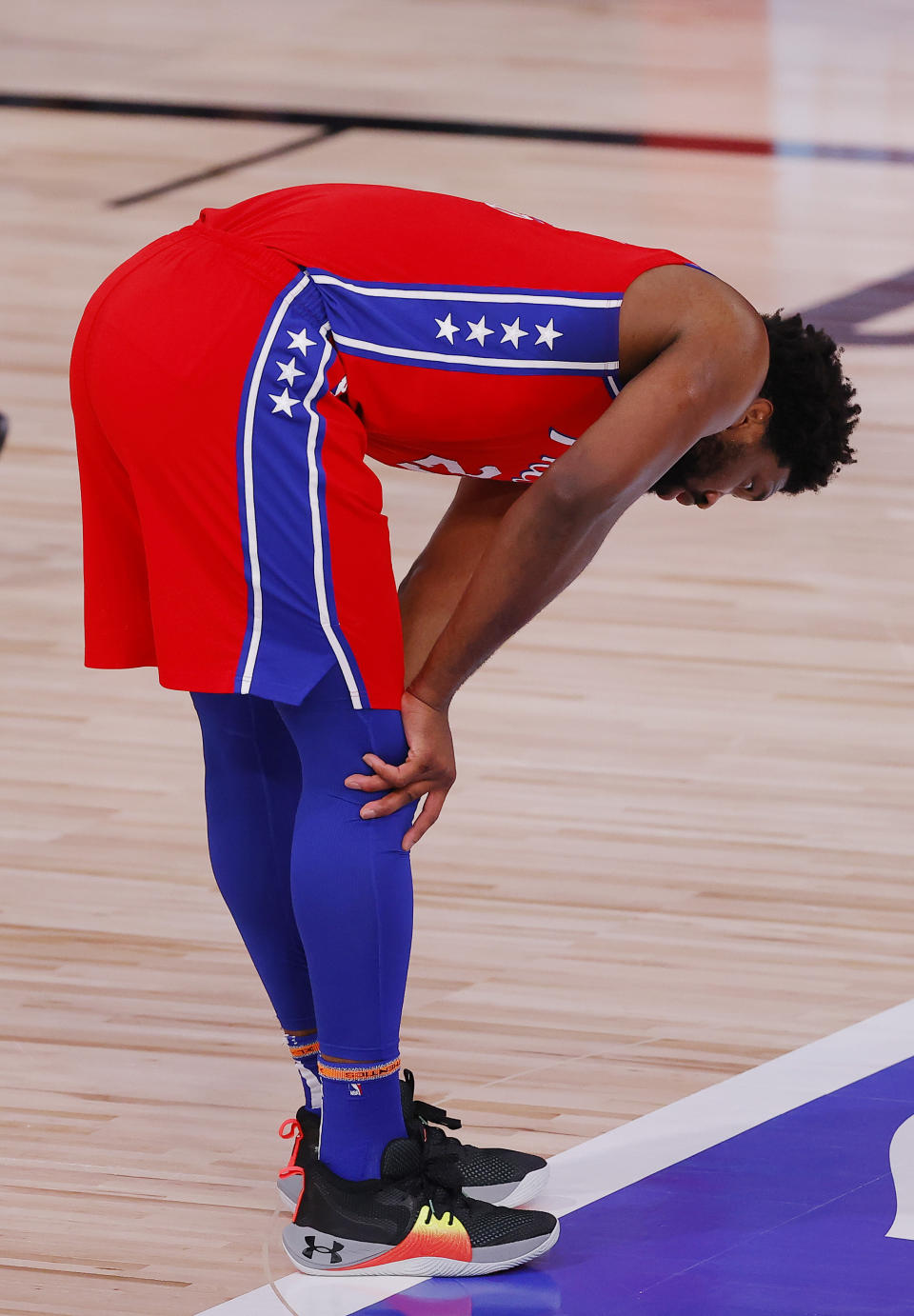 Philadelphia 76ers' Joel Embiid reacts during an NBA basketball game against the Portland Trail Blazers, Sunday, Aug. 9, 2020, in Lake Buena Vista, Fla. (Kevin C. Cox/Pool Photo via AP)