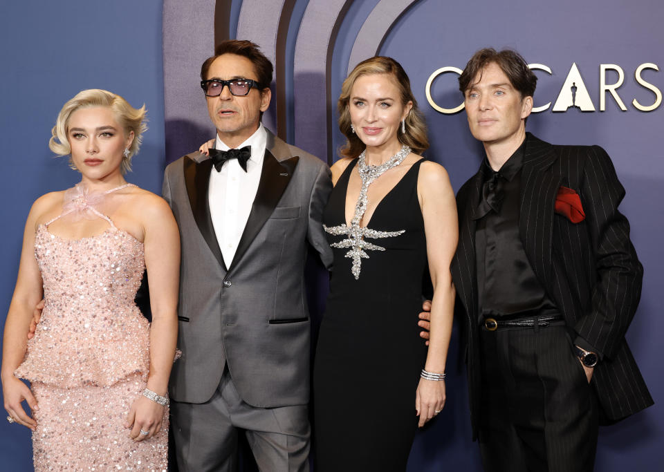 Close-up of Emily, Cillian, RDJ, and Florence at a media event