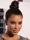 <div class="caption-credit"> Photo by: Getty Images</div><div class="caption-title">6. You're the Top</div>Thanks in part to bun-happy Kim Kardashian, the severe topknot trend shows no signs of abating this holiday season. At once elegant and outrageously sexy (all that neck!), it's a genius go-to look for your most swanky soiree. <br> <b>Related: <a rel="nofollow noopener" href="http://www.cosmopolitan.com/sex-love/relationship-advice/relationship-advice-for-women?link=rel&dom=yah_life&src=syn&con=blog_cosmo&mag=cos" target="_blank" data-ylk="slk:Relationship Advice From Men;elm:context_link;itc:0;sec:content-canvas" class="link ">Relationship Advice From Men</a> <br> Related: <a rel="nofollow noopener" href="http://www.cosmopolitan.com/advice/health/what-to-eat-before-a-workout?link=rel&dom=yah_life&src=syn&con=blog_cosmo&mag=cos" target="_blank" data-ylk="slk:Eat This Before You Work Out;elm:context_link;itc:0;sec:content-canvas" class="link ">Eat This Before You Work Out</a> <br> Related: <a rel="nofollow noopener" href="http://www.cosmopolitan.com/advice/work-money/ways-to-save-money?link=rel&dom=yah_life&src=syn&con=blog_cosmo&mag=cos" target="_blank" data-ylk="slk:How to Save Money And Still Have a Life;elm:context_link;itc:0;sec:content-canvas" class="link ">How to Save Money And Still Have a Life</a></b> <br>