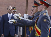 Egyptian President Abdel Fattah el-Sissi, left, attends a wreath laying ceremony at the Tomb of the Unknown Soldier in Moscow, Russia, Tuesday, Oct. 16, 2018. (Sergei Ilnitsky/Pool Photo via AP)