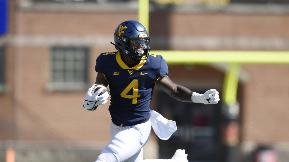 West Virginia running back Leddie Brown could be a good fit in an outside-zone run scheme. (AP Photo/Gail Burton)