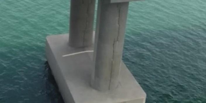 Photo with cracks on the pillars of the Crimean Bridge